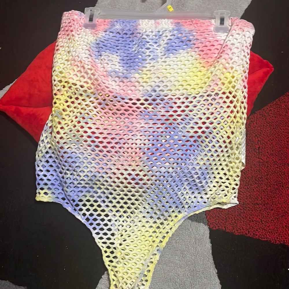 Multi pastel colored see through bodysuit from fashion nova.